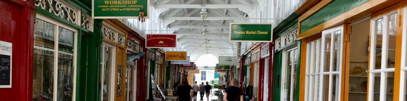 Corridor of shops in a permanent market building