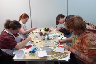 Young carers doing batik